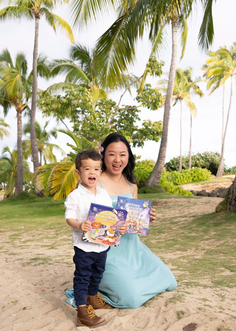 A parent and toddler enjoying Go Go sound books together